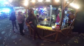 Lizzie Cundy gets a sausage at the Winter Wonderland in Hyde Park