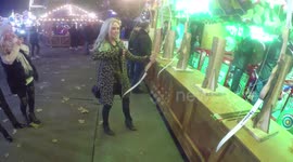 Nicola Hughes tires to shoot bow at Winter Wonderland