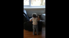 daughter playing with dog hurts nose