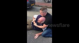 Off-duty cop wrestles road rage driver to ground after epic rant