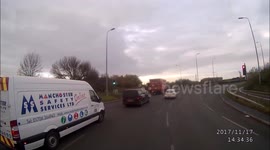 Very close near crash between HGV and biker.