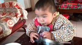 Baby falls asleep while eating lunch