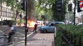 Car explodes into flames on London street