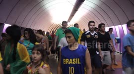 Brazil fans celebrating before their match, in Rio