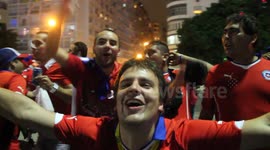 Chile fans stop traffic in Rio as they party
