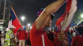 Chile fans party on road in Rio after beating Spain