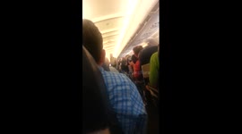 US Airways Flight 1735 Unruly Woman Arrested pt2