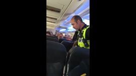 Drunk glasgow passenger threatens police officer when diverted to Bristol. Emergency landing