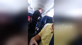 Newsflare Edit - US Airways Flight 1735 Unruly Woman Arrested