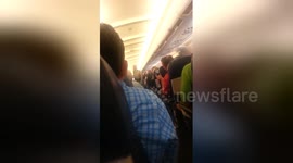 Newsflare Edit - US Airways Flight 1735 Unruly Woman Arrested pt2