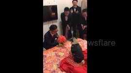 Pet dog intrudes new couple on wedding day