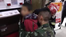 Firefighters free boy with hand stuck in lottery machine