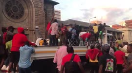 People jumping onto Driving School truck to celebrate President Mugabe’s resignation https://t.co/xcg3s3os4R