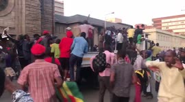 Celebrations erupt outside parliament after Mugabe resigns