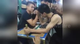Sickening moment man breaks bone in arm wrestle