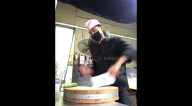 16 years old cook playing with a kitchen knife