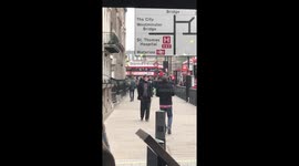 Man walking backwards in London for no apparent reason (near parliament house)