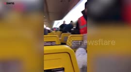Officers removed a passenger who boarded a flight WITHOUT a boarding pass