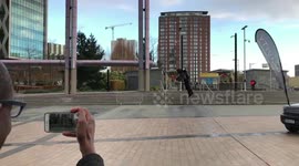 Inventor flies around Salford's MediaCity with jet pack