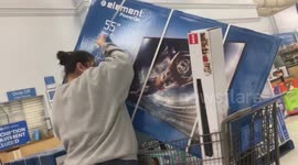Polite Shoppers Buy TVs in a Florida Walmart