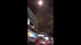 Black Friday Shooting, London, Oxford Circus Tube Station, Police cars and helicopters in the area, traffic at standstill.