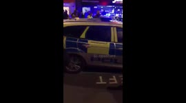 London shooting at Oxford Circus Tube Station, Police cars, ambulance and helicopters at the scene, area is taped off.