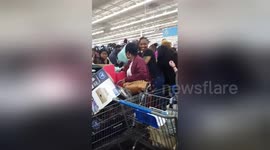 Scrum over towels at Texas Walmart on Black Friday