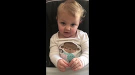 Cute baby says boo for first time