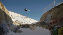 Skier flies into wall, goes down hard