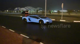 Lamborghini driver does donut in puddle