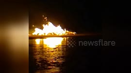 Newsflare Edit - Bonfire on the beach in Hoylake.