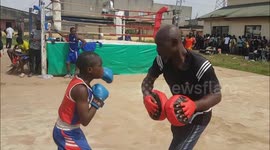 13-year-old takes part in street boxing session in Lagos