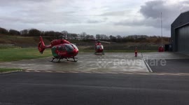 A Wales Air Ambulance EC135 lifts off from its Dafen base