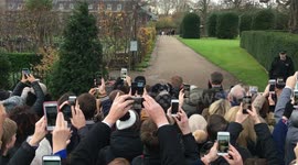 Jubilant Prince Harry leads Meghan Markle up garden path Kensington Palace 2017