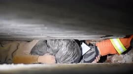 Firefighters rescue boy trapped between two walls