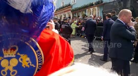 FILE: HM The Queen asks Royalist Town Crier a question during 'Windsor Walkabout' 2016