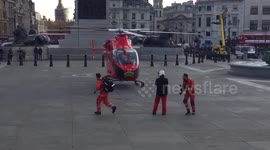 Air Ambulance helicopter lands in London's Trafalgar Square