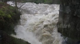 Cumbria's River Eden in full flood conditions