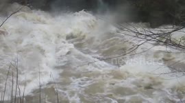 Cumbria's River Eden in full flood conditions