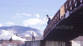 Skiers skis fall off during trick, still lands it