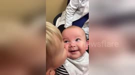 Heartwarming video of baby born deaf hearing for first time