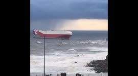Ship entering the tyne in force 8 north wind and heavy sea in heavy sleet and snow showers