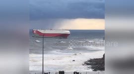 Newsflare Edit - Ship entering the tyne in force 8 north wind and heavy sea in heavy sleet and snow showers