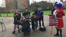 Prince Harry and Meghan Markle hear joyful proclamations by Royalist Town Crier (1/3)