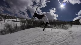 Skiers hand drag turns into body drag