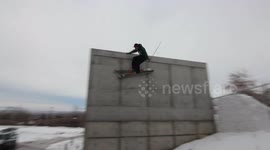Skier gets wrecked by chainlink fence