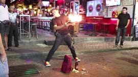 Street magician's cigarette smoking magic tricks