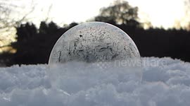Mesmerising footage of a bubble freezing