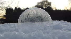 Mesmerising footage of a bubble freezing