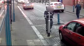 Horrific footage captures the moment a fuming thug hurled a traffic warden to the ground - because he was giving him a ticket